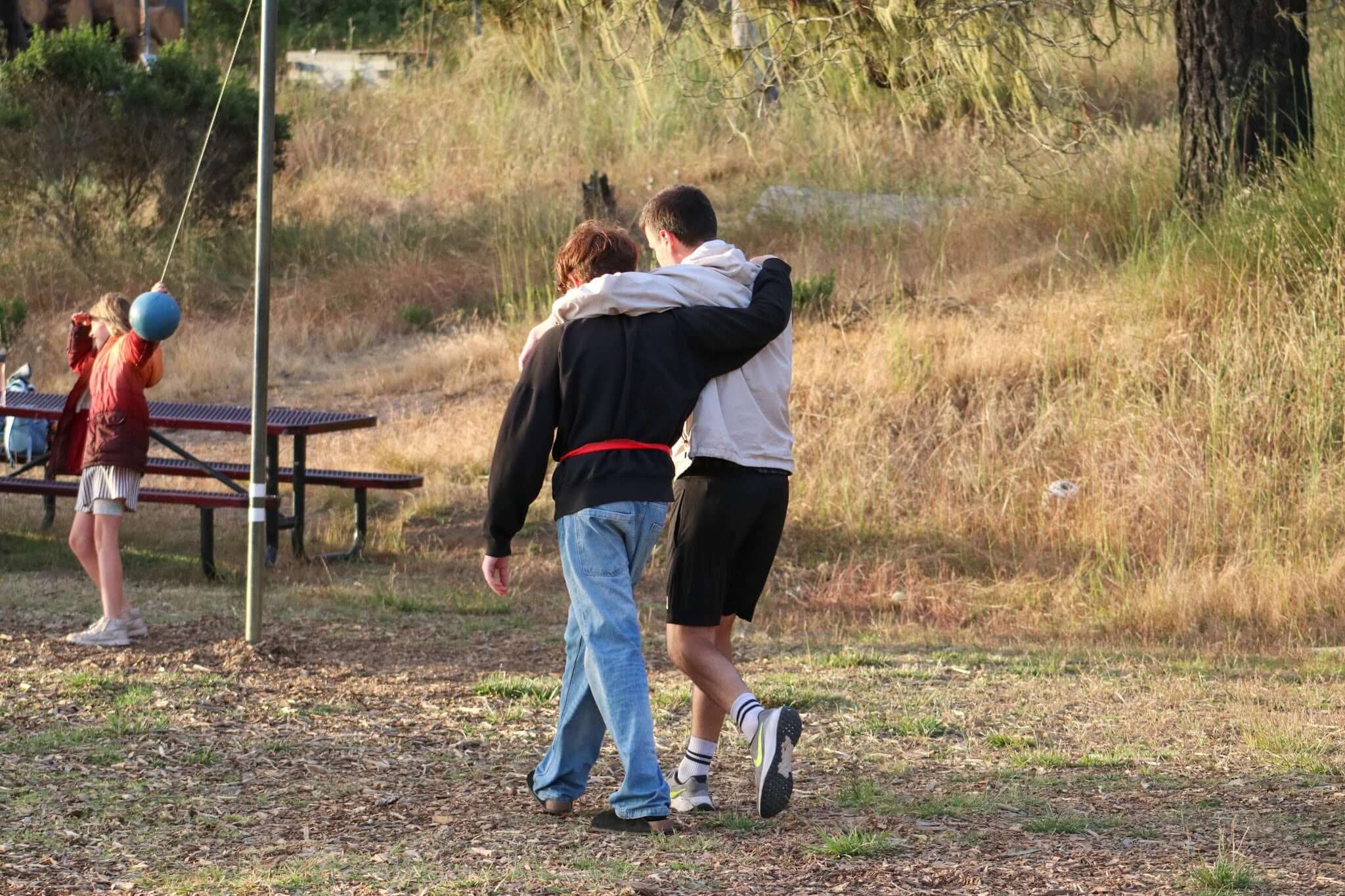 Kids at Camp Ocean Pines enjoying friendship and outdoor activities in California summer camp setting.