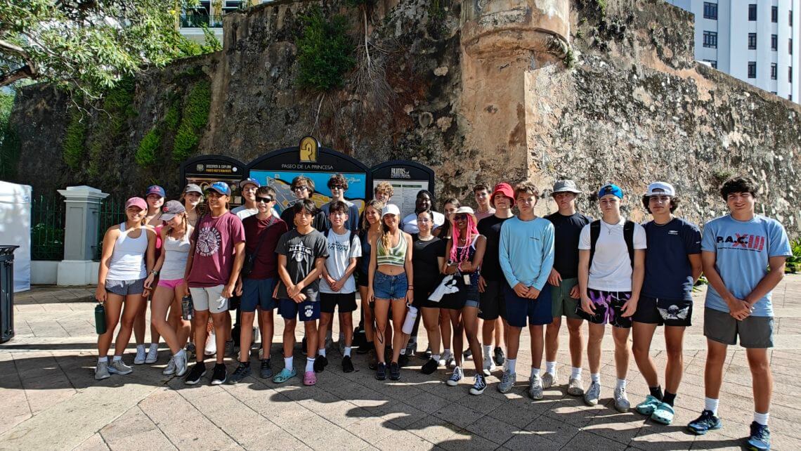 Group of high school teens participating in a summer program for hurricane relief in Puerto Rico.