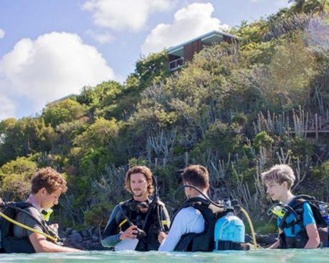 Teens participating in a scuba diving lesson during ActionQuest summer programs in the British Virgin Islands.