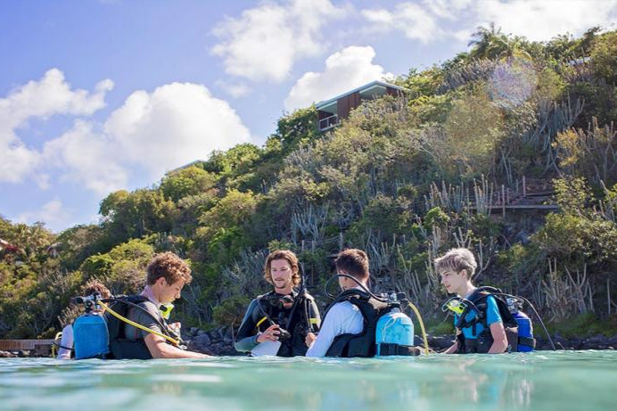 Teens participating in a scuba diving lesson during ActionQuest summer programs in the British Virgin Islands.